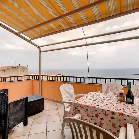 Attico L' Onda Marina Apartment